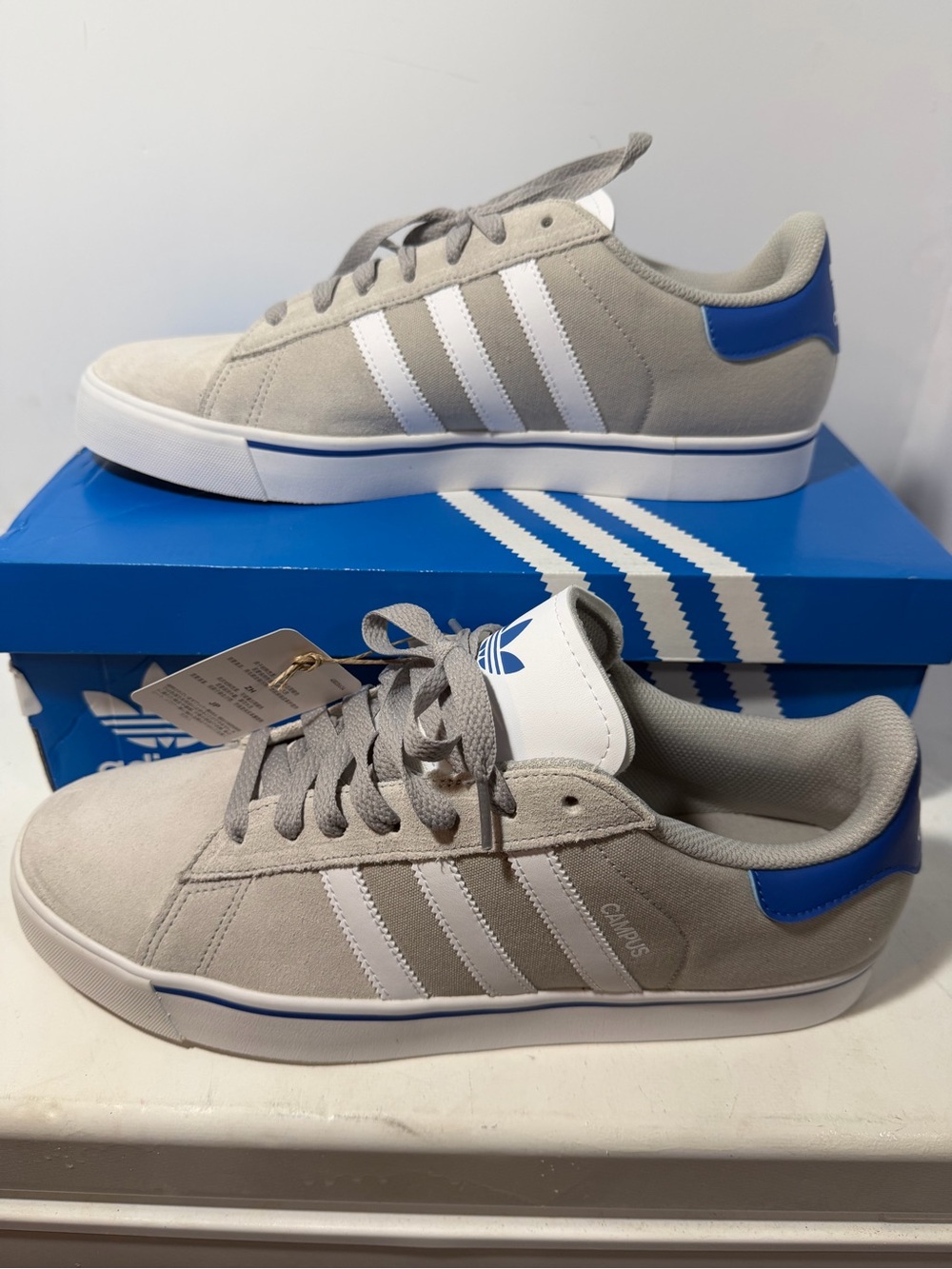 adidas Men’s Gray Suede Sneakers with White Stripes and Blue Heel